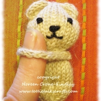 Tiny Teddy Bears that hug the hand that holds them
